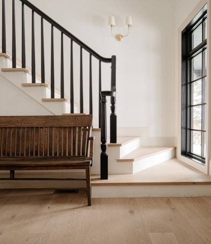 staircase solution featuring Ingrid squared stair nosings by Stuga hardwood flooring in home of Chris Loves Julia