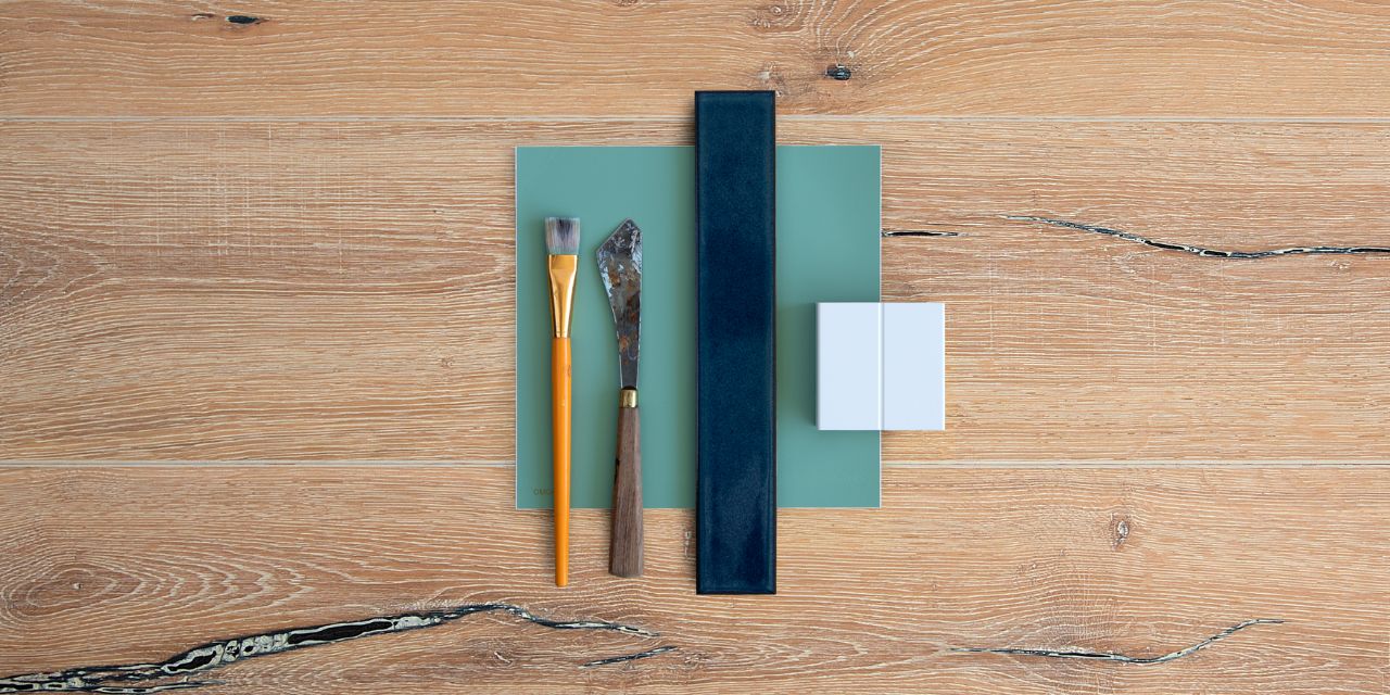 Pepper rustic wood flooring overhead view with art supplies