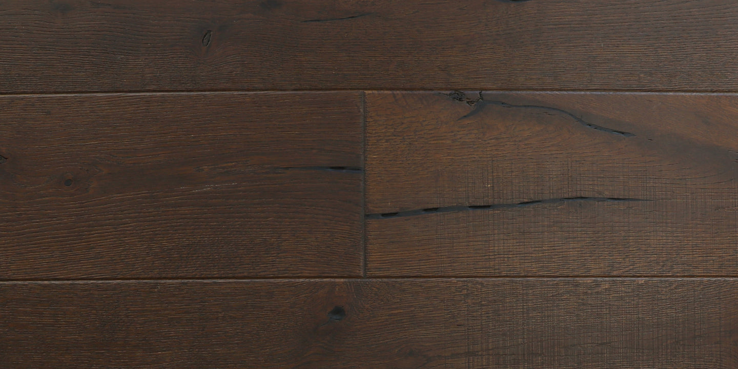 Overhead view of dark brown wood flooring with filled cracks and checks Solstice by Stuga