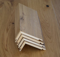Flush stair nosings made of white oak wood