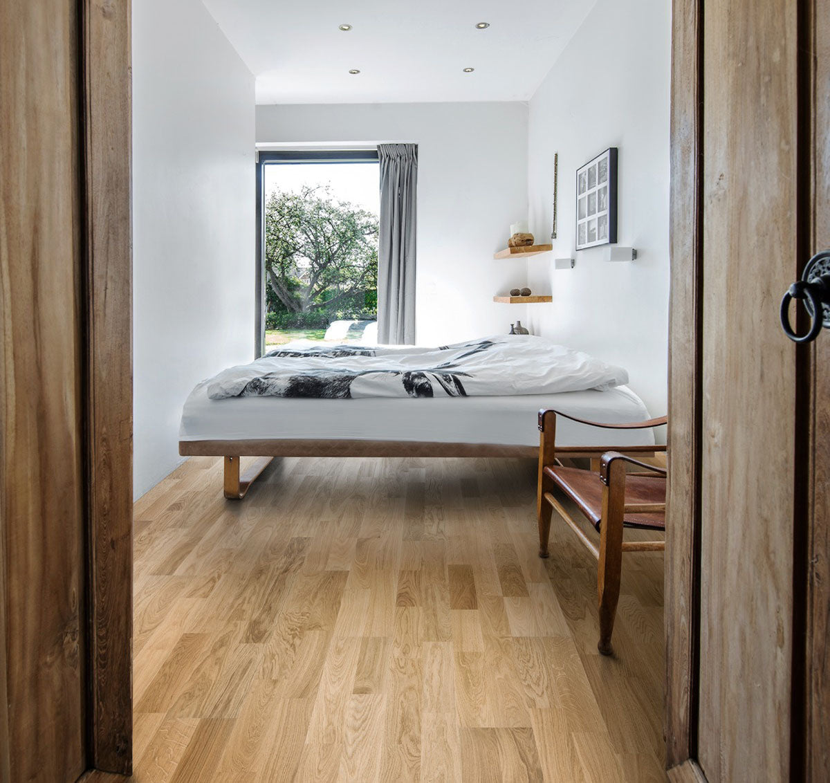 Natural white oak hardwood flooring used in bedroom remodel inspiration. louisiana modern engineered hardwood flooring by stuga