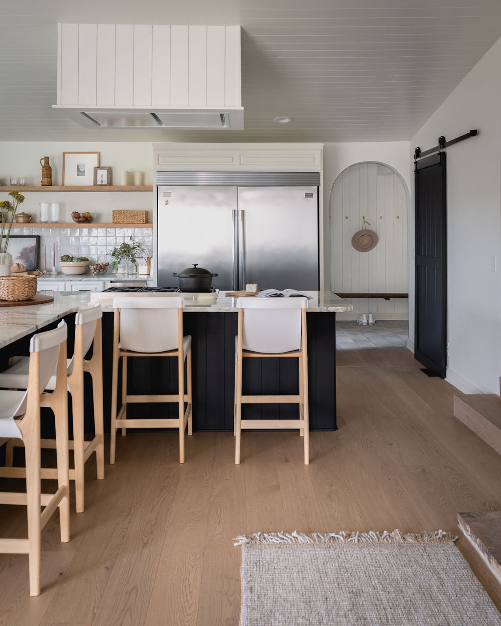 Akvavit white oak flooring by Stuga covered in colorful dried flowers