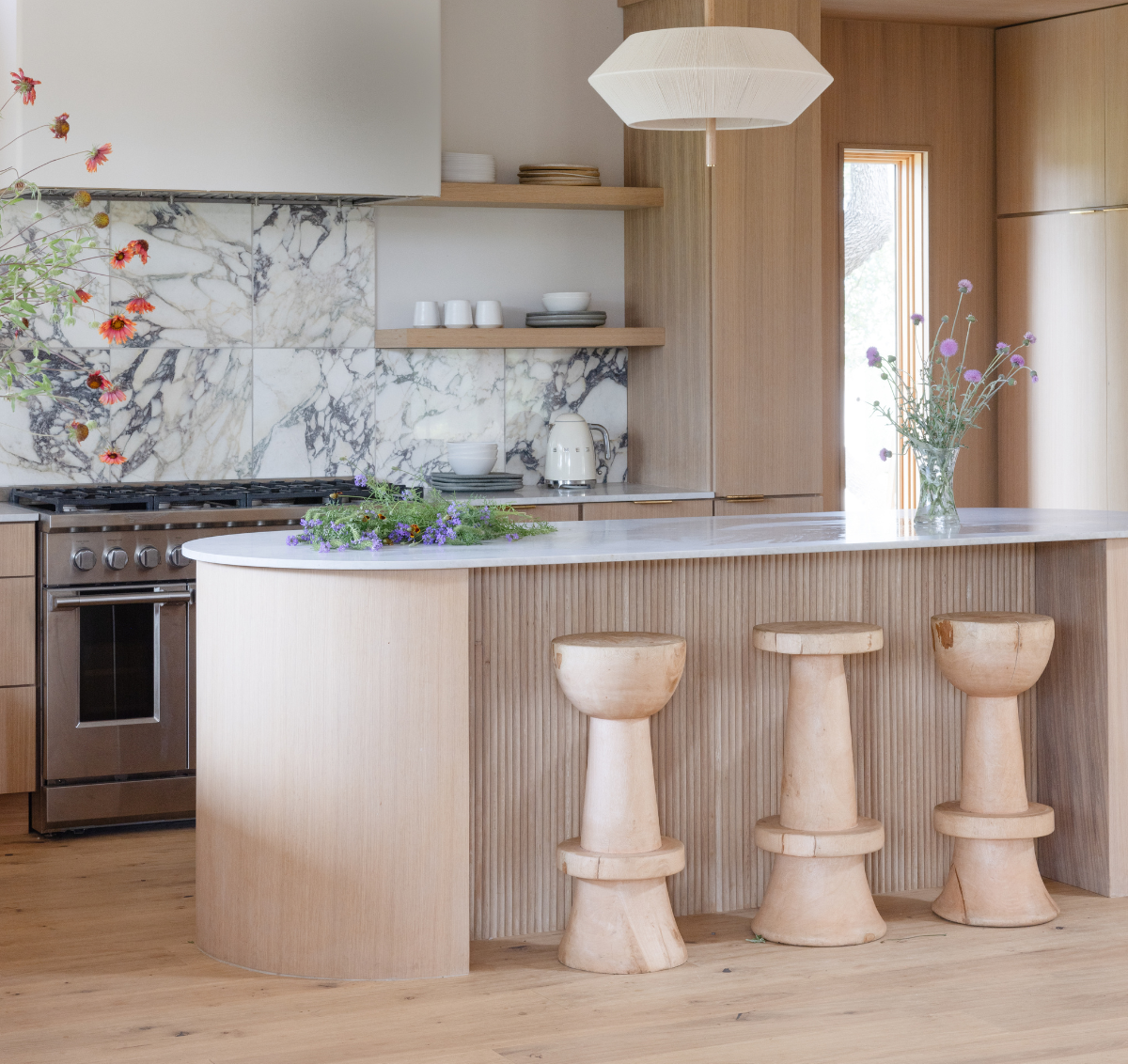 A modern 2024 kitchen with wood flooring