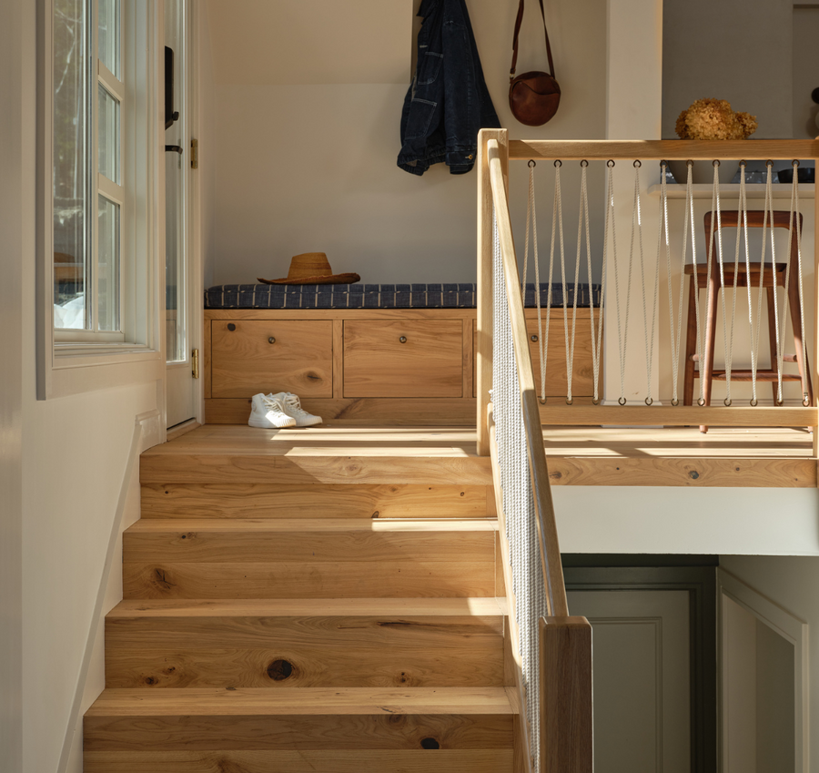 Metamerism changes color of hardwood flooring on a shadowed staircase