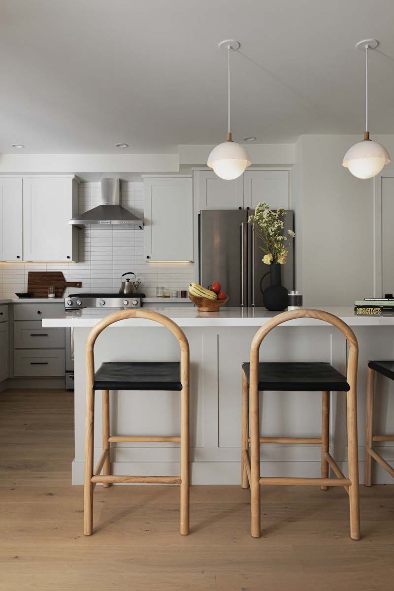 Greta white oak flooring in a modern kitchen with black stools