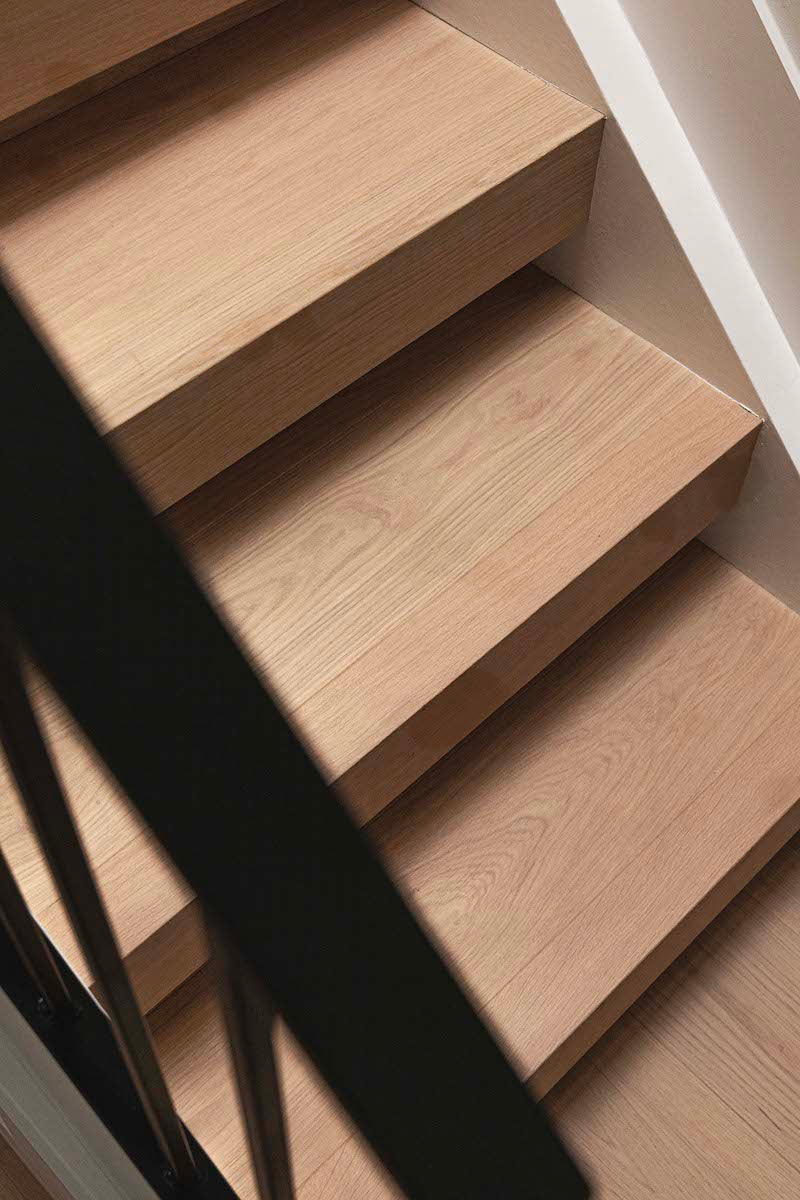 Greta modern white oak flooring on a staircase with flush nosings