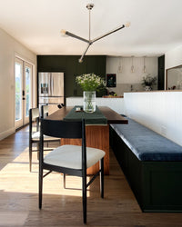 Harbor hand scraped wood flooring in a kitchen dining area with custom banquette seating