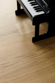 Waterproof hardwood flooring with a toy piano