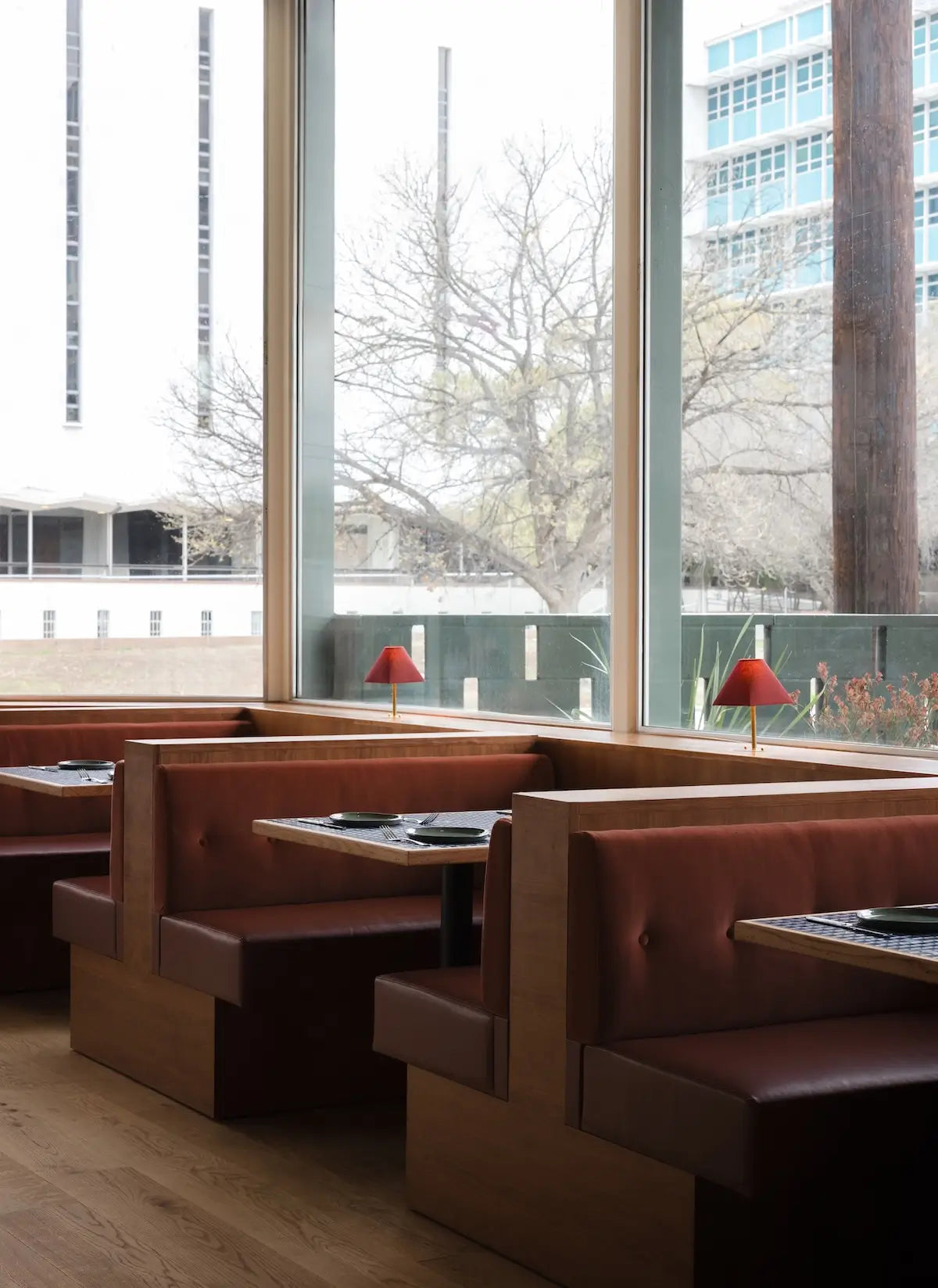 Modern restaurant interior in San Antonio with warm hardwood flooring