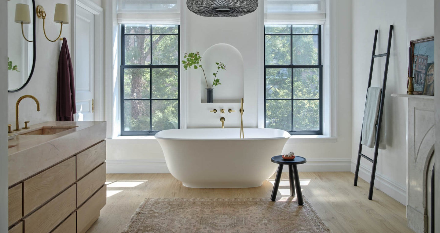 Greta modern white oak flooring in a luxury bathroom with freestanding tub