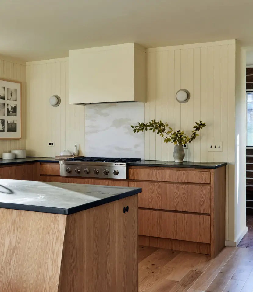 Forest rustic natural white oak flooring in a modern kitchen with stained wood cabinets