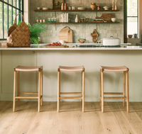 Neutral white oak flooring in a modern kitchen