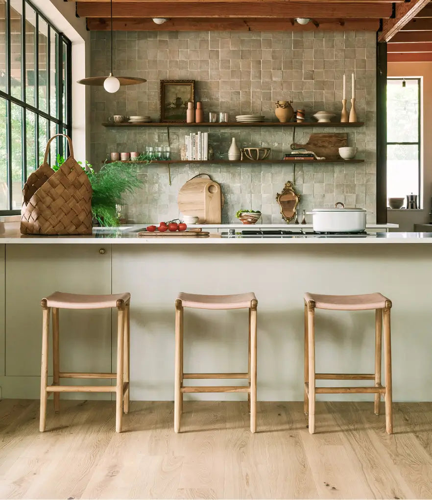 Neutral white oak flooring in a neutral modern kitchen