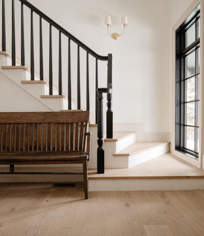 staircase solution featuring Ingrid squared stair nosings by Stuga hardwood flooring in home of Chris Loves Julia 