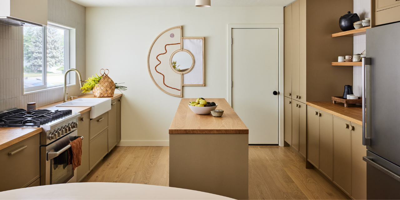 Modern kitchen by Sarah Sherman Samuel with white oak flooring, wood counters, and green cabinets