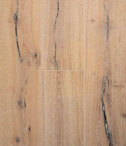 Rustic wood flooring overhead view with large filled cracks checks