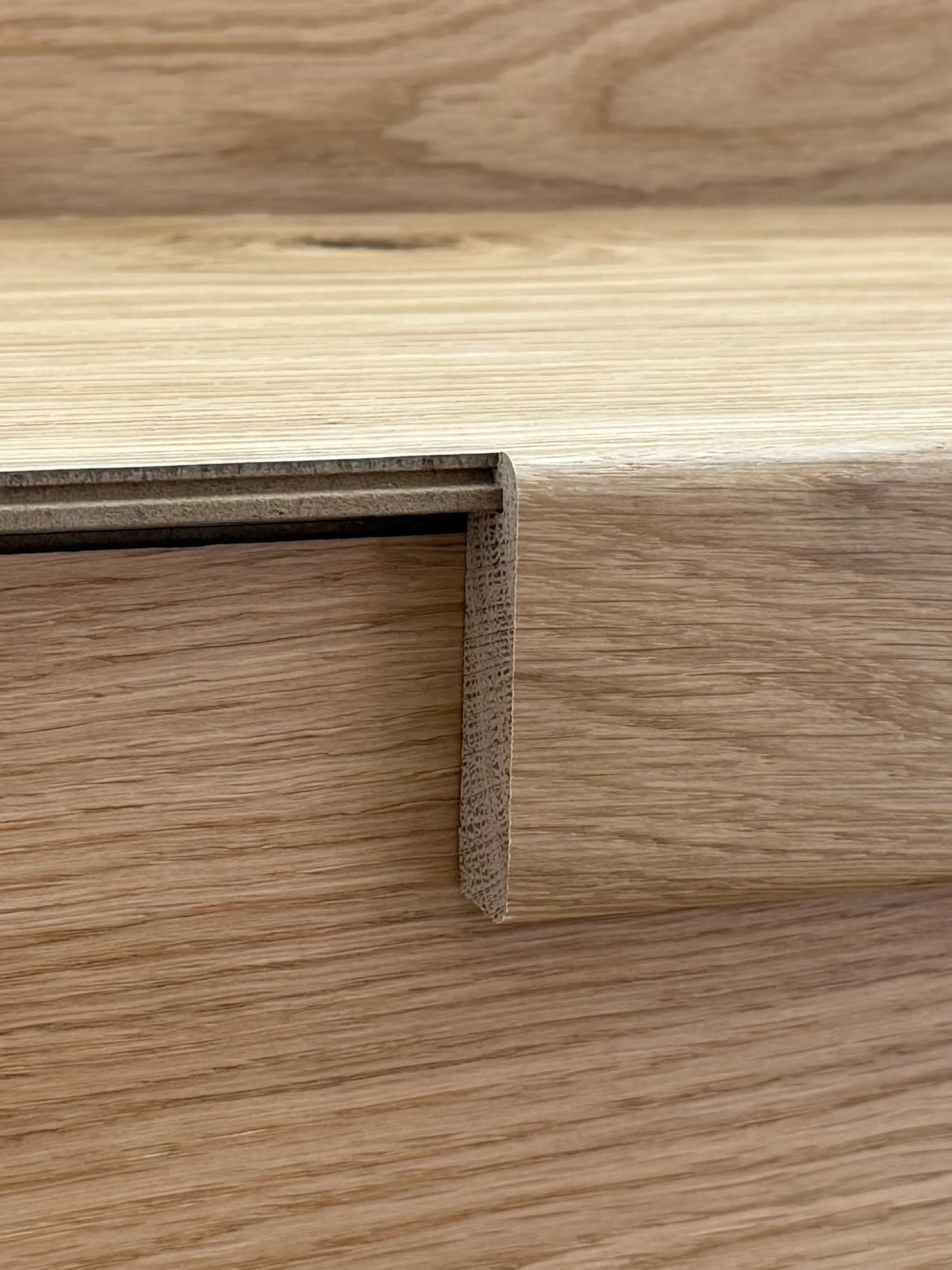 Closeup of a Stuga Rebels squared stair nosing profile view