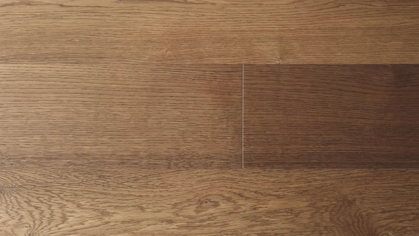 Overhead view of matte finish wide plank hardwood flooring by Stuga