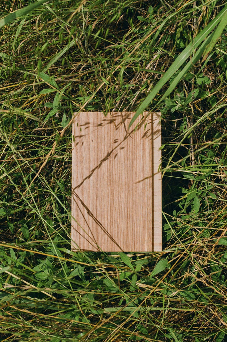 Tivoli Scandinavian wood flooring in a field of grass