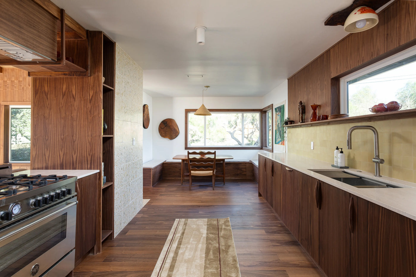 kitchen with walnut cabinets and walnut flooring