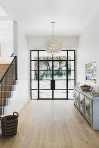 Window view with Stuga square stair nosings and Greta modern white oak flooring