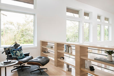 Built in bookcase and Eames chair on Scandinavian flooring by Stuga