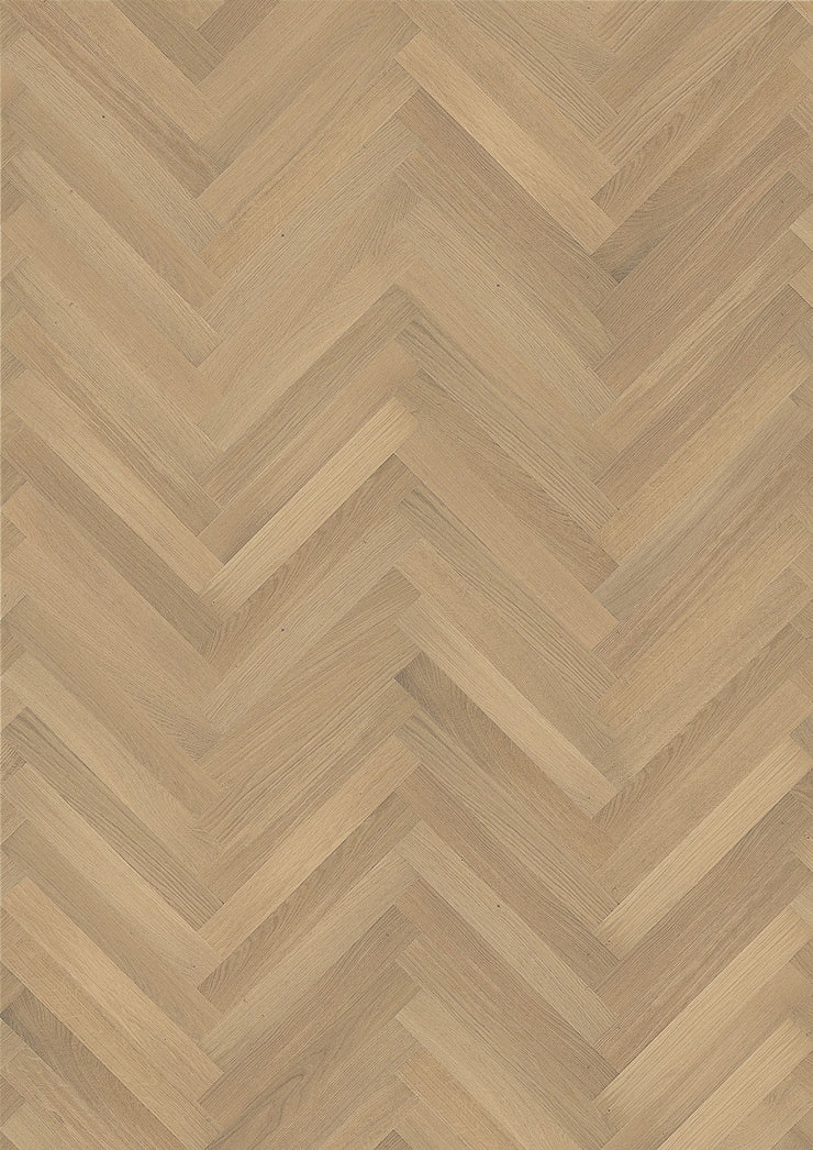 White oak herringbone hardwood flooring by Stuga creates a subtle pattern