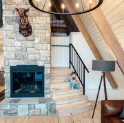 beautiful cabin like photo featuring child sitting on stuga staircase solution pepper hardwood flooring
