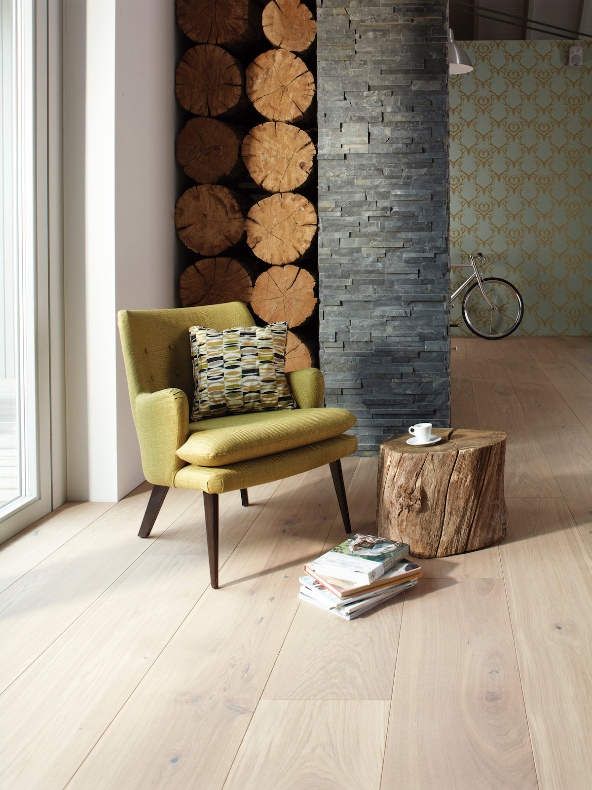 Stuga 12 inch wide plank hardwood flooring in a living room with Scandinavian furniture. 