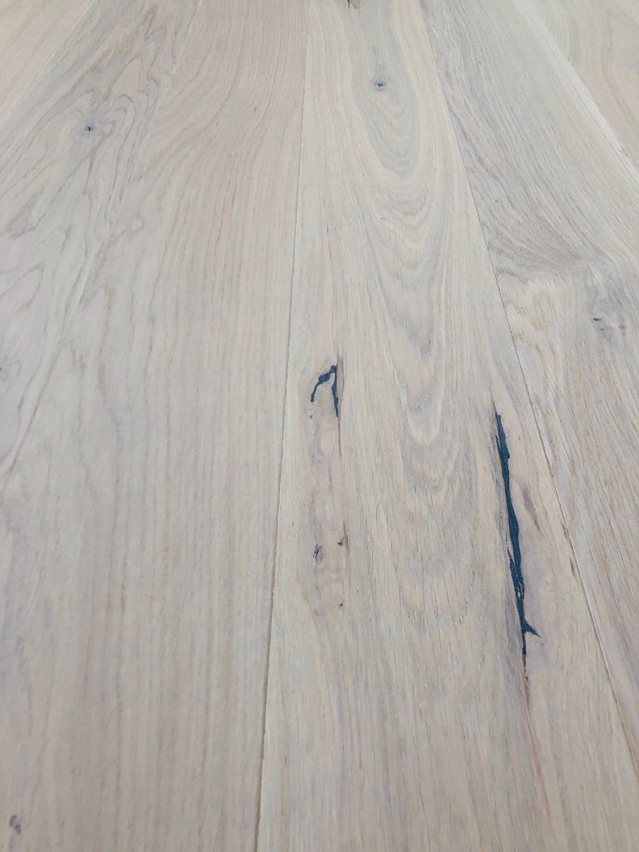 Blonde hardwood flooring by Stuga