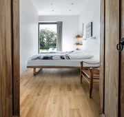 Natural oak hardwood flooring used in bedroom remodel inspiration. louisiana engineered hardwood flooring by stuga