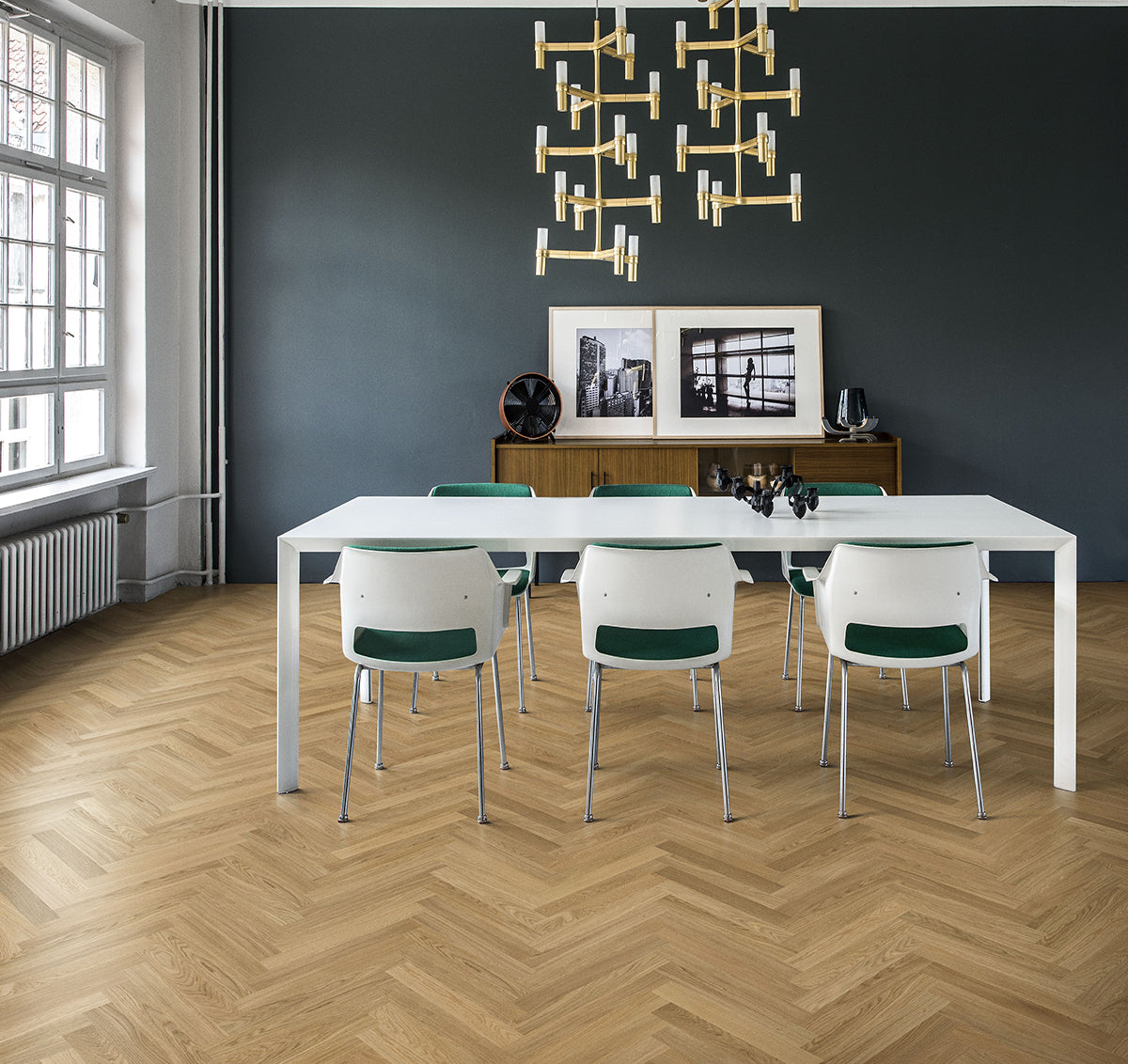 Classic herringbone flooring in a dining area. Home inspiration with Stuga hardwood flooring