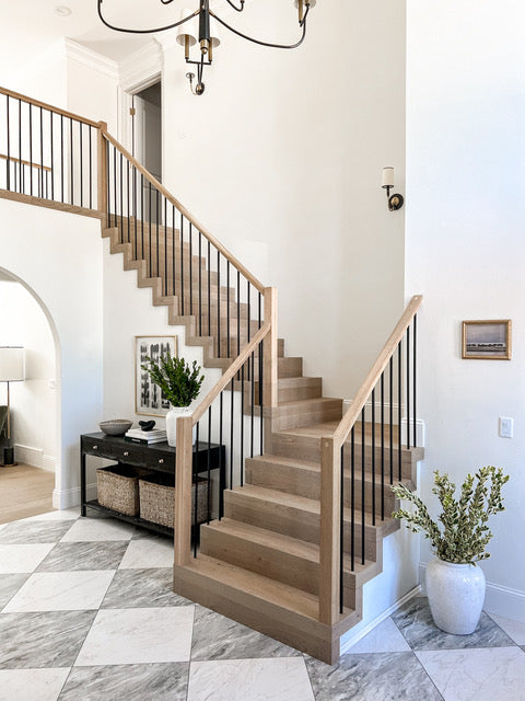 Modern hardwood staircase with flush stair nosings