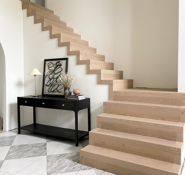 Flush stair nosings on an unfinished modern staircase