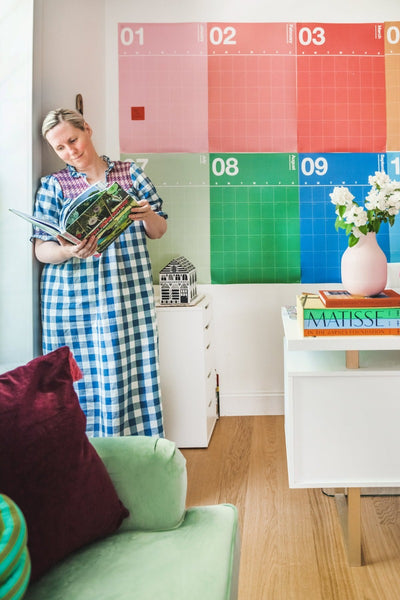 Woman working in home office with Tivoli hardwood flooring by Stuga