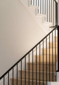 Modern squared stair nosings with wood risers