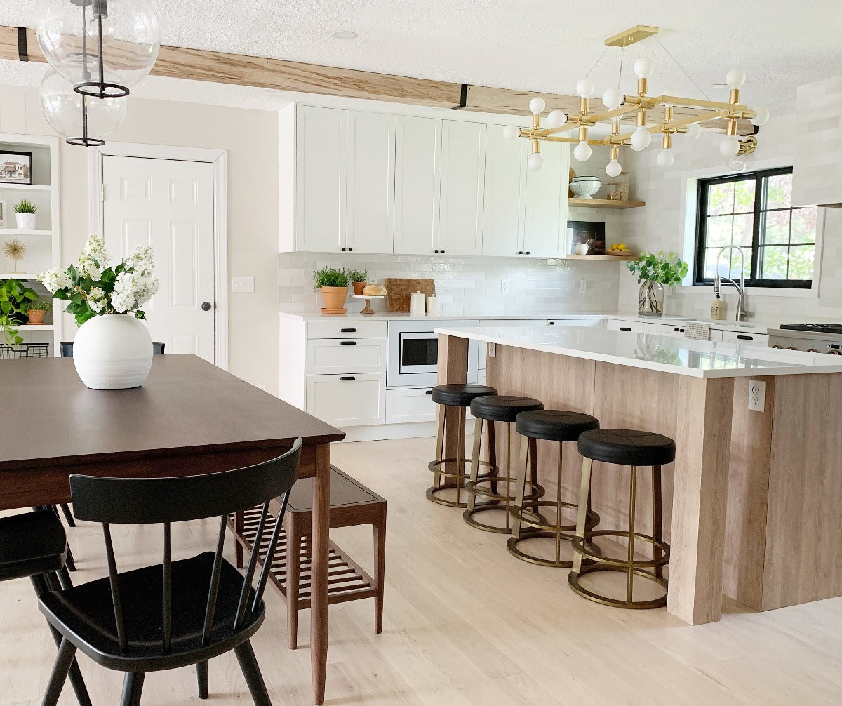 Stuga Moonlight hardwood flooring used in a modern kitchen with wood cabinets